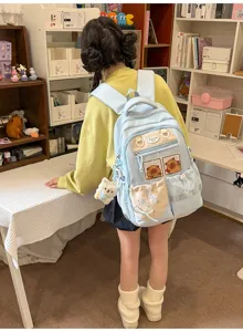 Joli sac à dos scolaire bleu clair pour filles, sac de loisirs mignon avec pendentif en peluche.