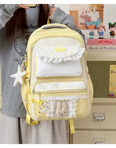 Sac à dos décontracté pour étudiante style japonais doux avec peluche lapin mignonne et dentelle.