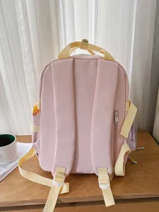 Cute pink backpack with yellow straps casual daily school bag for teenage girls and students.