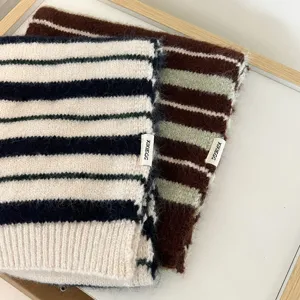 Striped knit scarf detail, winter warm wool blend neckwear with contrast color design.