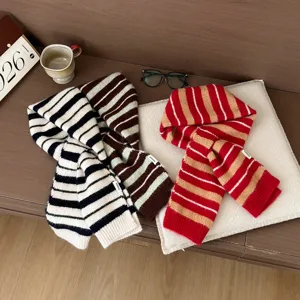 Cozy winter knitted striped scarf with stylish color block design for women daily wear.