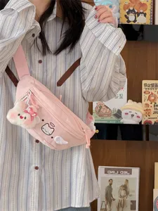 Cute pink canvas chest bag detail, cat embroidery design with plush rabbit pendant view.