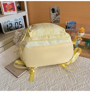 Yellow white plaid school backpack for cute girls, casual student bookbag for travel and daily study.