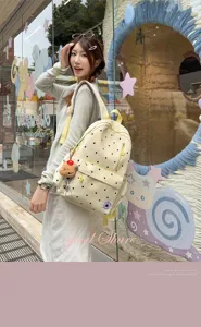 Zaino giallo carino a pois per ragazze, borsa da scuola dolce per viaggi e tempo libero quotidiano.