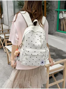 Zaino carino a pois in tela per donna, borsa scolastica elegante con tasca frontale.