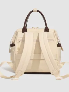 Sac à dos à langer multifonctionnel avec de grands compartiments pour les sorties de maman.