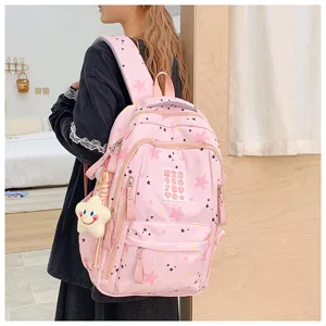 Japanese ins style pink school backpack for girls, cute star pattern large capacity bag.