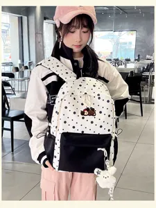 Modischer schwarzer und weißer gepunkteter Schulrucksack für Mädchen im Alltag