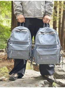 Detailed view of the blue plaid school backpack, lightweight casual daypack for students.