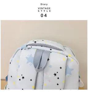 Light blue star print backpack for daily use, school bag with top handle and straps.