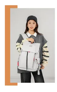 Light grey multi-purpose backpack for daily commute and travel with multiple pockets.