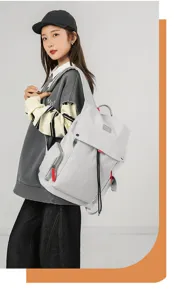 Grey multi-purpose casual backpack with large capacity and multiple pockets for daily use.