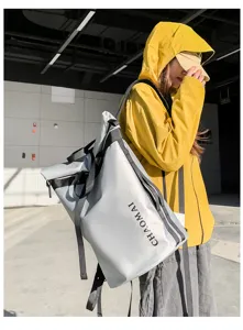 Outdoor functional roll-top backpack for men and women, commuter travel casual school bag.