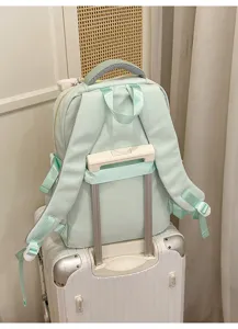 Mint green travel backpack student school bag with luggage strap for daily use and outdoor trips