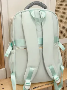 Japanese style campus cute mint green student backpack with multiple straps and large capacity.