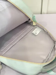 Cute Japanese school student backpack in light blue, spacious interior, casual daily bag.