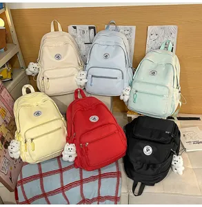 Zaino scolastico casual in tela da donna, grazioso zainetto stile college con ciondolo in peluche.