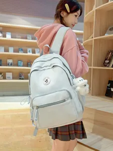 Zaino casual stile campus da donna, grazioso zainetto azzurro chiaro con ciondolo