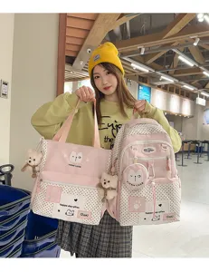 Korean ins style pink polka dot school backpack and tote bag set with cute bear pendant for students.