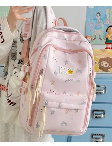 Korean style pink backpack for teenage girls with cute star patterns and large capacity.