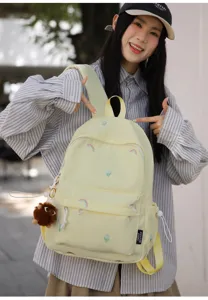 Cute Japanese style embroidered backpack for school girls, light yellow travel school bag daily use.