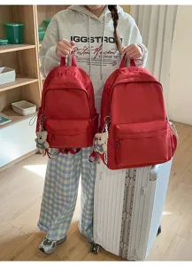 Casual red student backpack minimalist solid color school bag for daily commute travel use