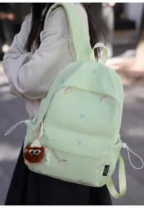 Japanese cute embroidered school backpack for girls, lightweight travel daypack with tulip design.