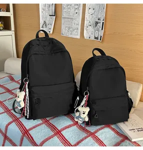 Classic black school backpack set with cute bear pendant, casual gothic style bookbag.