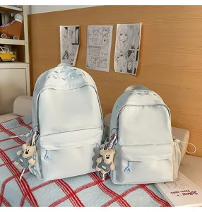 Korean style solid color school backpack set with cute bear pendant for daily commute and travel