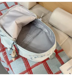 Casual aesthetic backpack with spacious interior, zipper closure, and stylish design.