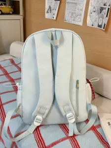 Solid color casual backpack for women, cute daily school bag with multiple pockets.