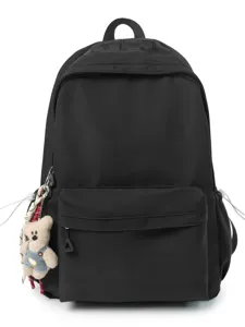 Classic black casual backpack for daily commute and travel with cute bear pendant accessory.