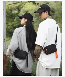Casual cross-body bag for men and women, lightweight outdoor mobile phone shoulder bag detail.