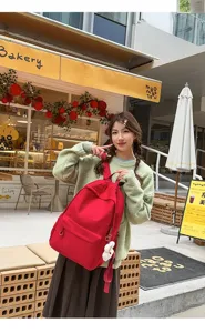 Japanese style large capacity school backpack for women, casual commuter book bag.
