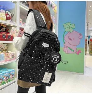 Zaino scolastico con motivo a stelle nere e piccola pochette, elegante zaino casual.