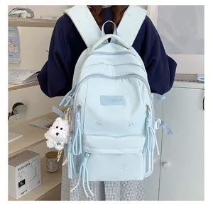 Sac à dos de style collège mignon grande capacité pour filles école et voyage décontracté.