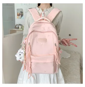 Joli sac à dos rose pour filles, grand cartable de grande capacité pour l'école et les voyages.