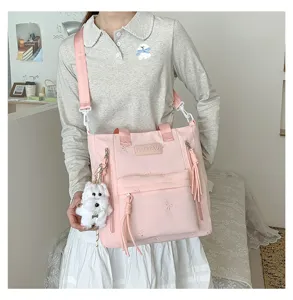 Sac à bandoulière rose mignon avec pendentif chiot, grand design de style collège.