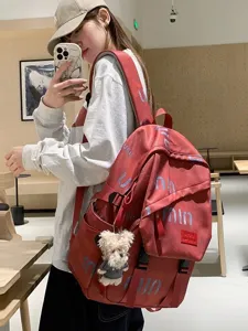 Red stylish college student backpack street trend travel computer school bag for women.