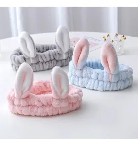 Soft plush rabbit ear headband detail view, ideal for facial washing, makeup and daily skincare.