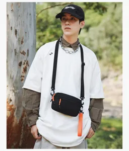 Casual black crossbody bag for men and women, lightweight outdoor daily commuter shoulder bag.