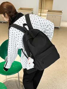 Japanese style large capacity black backpack for school girls, casual minimalist daily book bag.
