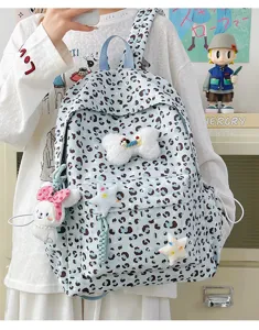 Cute Japanese ins style blue leopard print backpack with plush bow and rabbit pendant for daily.