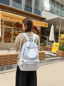 Japanese style large capacity school backpack for women simple casual daypack with cute pendant