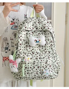 Cute Japanese style leopard print backpack with plush rabbit charm casual student bookbag