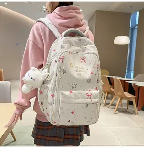 Cute school style backpack for students travel commuting with star and bow prints.