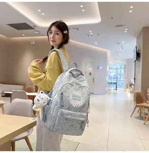 Japanese aesthetic star print canvas backpack with cute plush pendant for daily school commuting