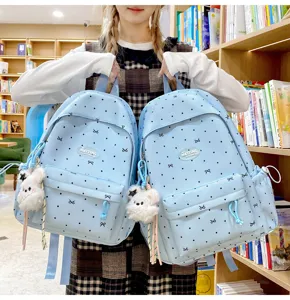 Cute polka dot bow school backpack for girls large capacity casual book bag light blue