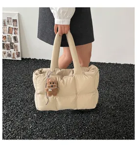 Chic quilted puffer tote bag for women, soft down cotton pillow shoulder bag with cute charm.