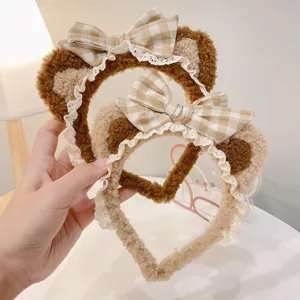 Cute plush cat ear headband with plaid bow and lace trim, sweet Lolita hair hoop accessory.